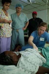 Kleeman and Cat exam a patient