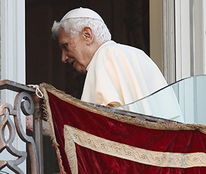 Pope Benedict XVI walks away after making final public appearance as pope in Castel Gandolfo Pope Benedict XVI walks away after making final public appearance as pope.