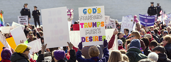 People demonstrate outside Supreme Court building as justices hear arguments in case challenging California's same-sex marriage ban
