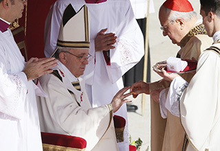 Pope Francis receives ring during inaugural Mass in St. Peter's Square at Vatican Pope Francis receives ring during inaugural Mass in St. Peter's Square at Vatican