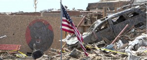 U.S. flag stands near destroyed car outside Oklahoma elementary school destroyed in massive tornado U.S. flag stands near destroyed car outside Oklahoma elementary school destroyed in massive tornado