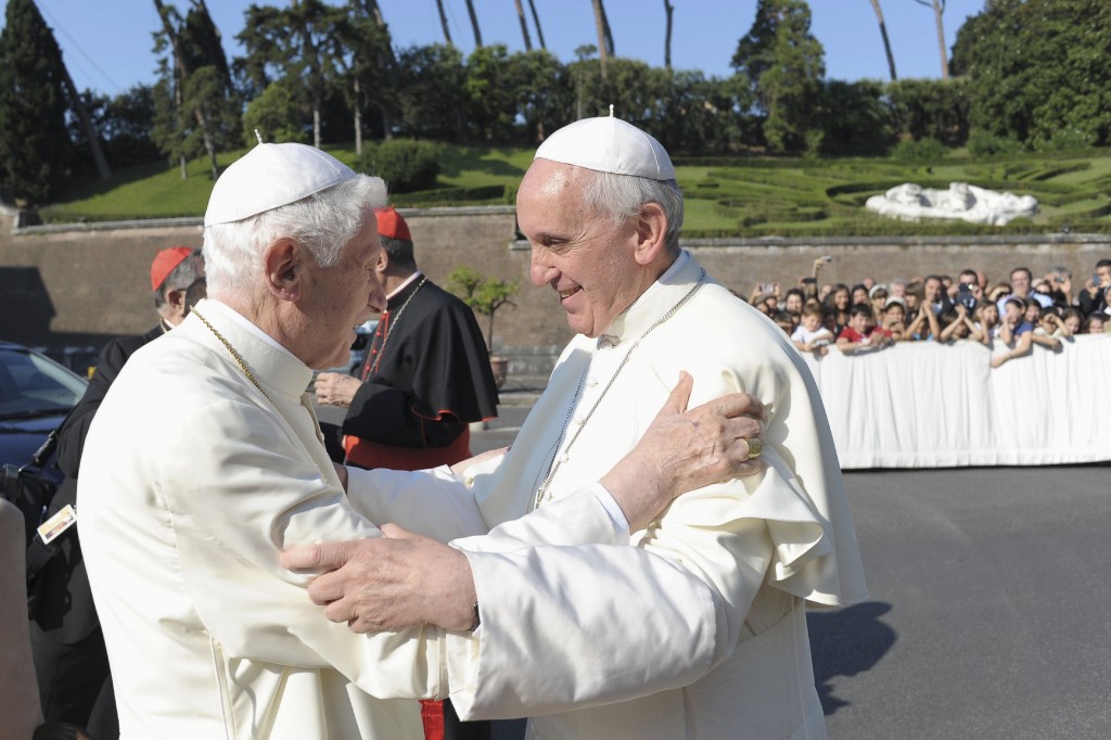 Pope Francis embraces retired Pope Benedict during ceremony in Vatican gardens
