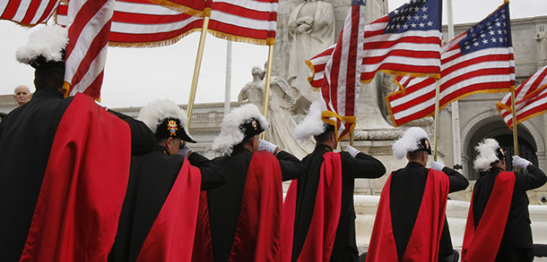 KNIGHTS OF COLUMBUS CARRY FLAGS AT NATIONAL COLUMBUS MEMORIAL CENTENNIAL CELEBRATION