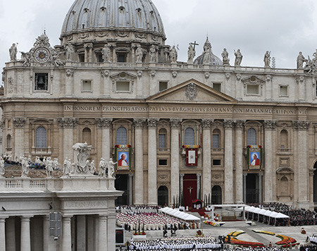 Pope Francis celebrates canonization Mass of Sts. John XXIII and John Paul II in St. Peter's Square at Vatican Pope Francis celebrates the canonization Mass for Sts. John XXIII and John Paul II in St. Peter's Square at the Vatican April 27. (CNS photo/Paul Haring) (April 27, 2014) See SAINTS-MASS and SAINTS-COLOR April 27, 2014.