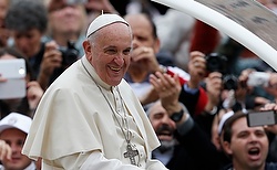 Pope Francis arrives to lead general audience in St. Peter's Square Pope Francis arrives to lead his general audience in St. Peter's Square at the Vatican Nov. 12. (CNS photo/Paul Haring) See POPE-AUDIENCE Nov. 12, 2014.