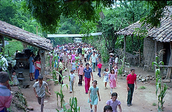 Crowd walks with Archbishop Oscar Romero in El salvador in 1979