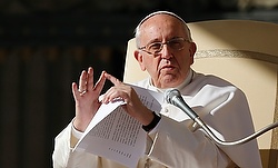 Pope Francis points to one of his fingers during general audience in St. Peter's Square