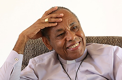 Archbishop Guire Poulard of Port-au-Prince, Haiti, smiles during interview with Catholic News Service