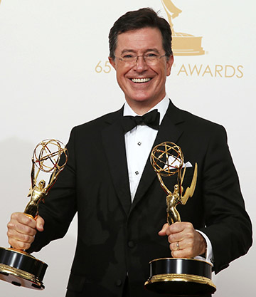 Stephen Colbert, who took over Sept. 8 as host of CBS' "Late Night" program, said in an interview for Canada's Salt and Light Television that his "Colbert Report" character was intended to be a "well-≠intentioned, poorly informed, high≠status idiot." Colbert is pictured in a 2013 photo. (CNS photo/Lucy Nicholson, Reuters)