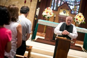 Miami Archbishop Thomas G. Wenski, who is leading a Sept. 18-21 pilgrimage from Miami to Havana in support of Pope Francis' historic visit to the island, prays at the Church of St. Marta during a Sept. 11 meeting with some of the 180 Florida pilgrims who plan to travel to Cuba. It will be the third papal pilgrimage to Cuba that the Miami Archdiocese has led since St. John Paul II's historic visit in 1998. (CNS photo/Tom Tracy)