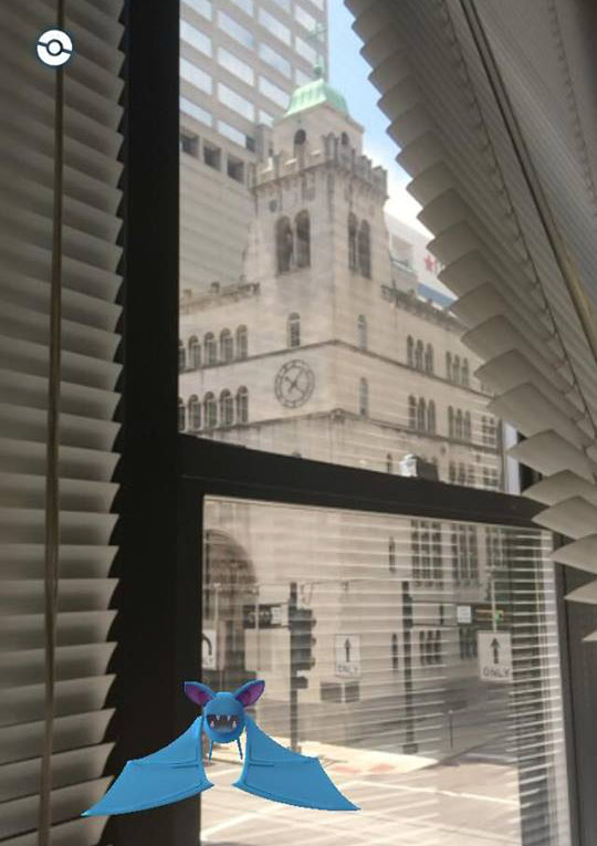 A Pokemon creature known as a Zubat appears in the office of The Catholic Telegraph, across the street from St. Louis Church in downtown Cincinnati. In the game Pokemon GO, creatures from the came "appear" in the real world via mobile phone cameras. (CT Photo/John Stegeman)