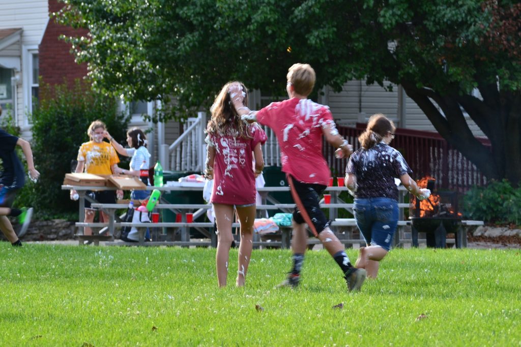 The shaving cream is out at Totus Tuus Fun night. (CT Photo/Greg Hartman)
