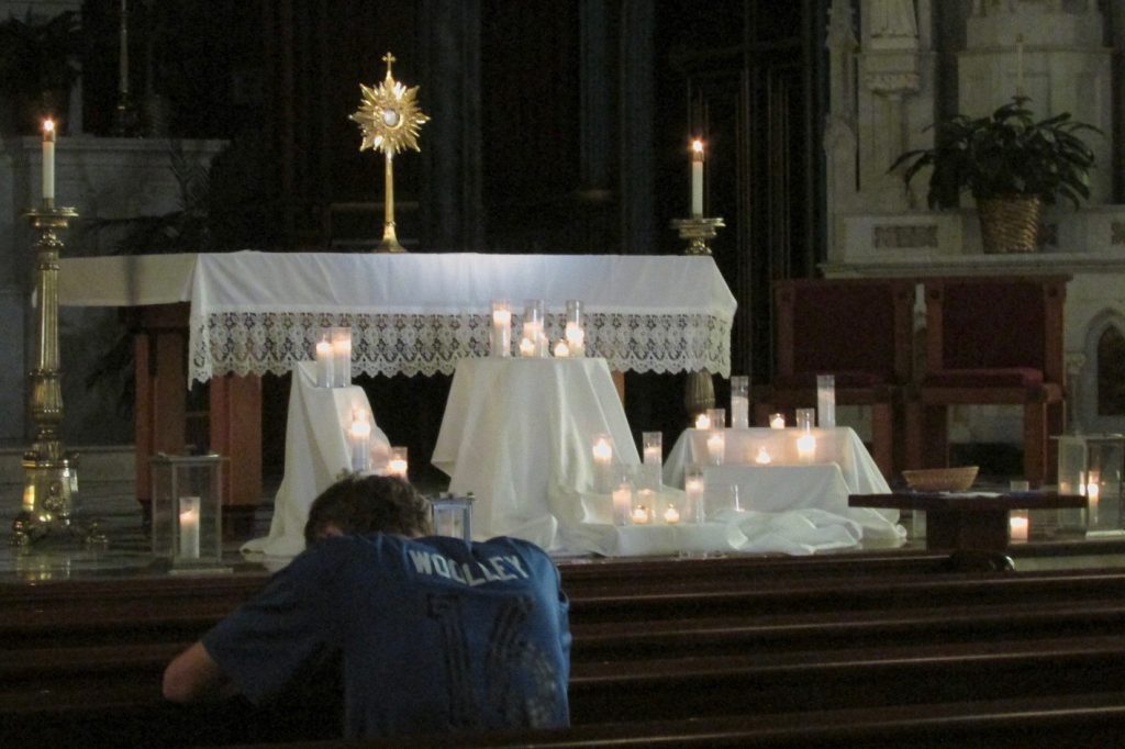 Candles burned bright for prayer intentions the Missionary Disciples gathered for Light in the City (CT Photo/Gail Finke)