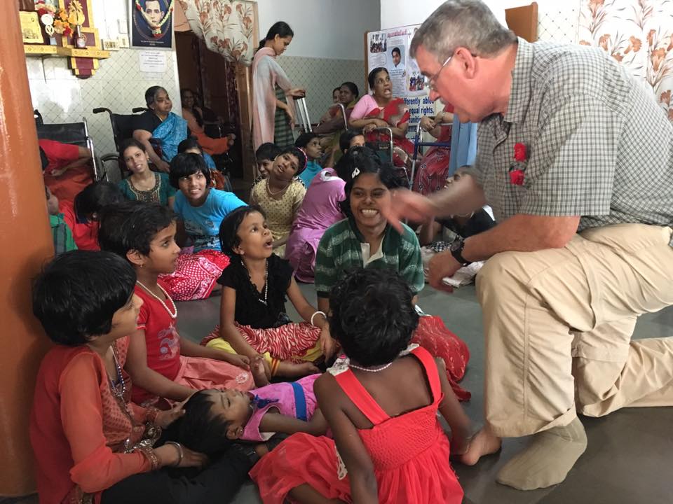 Visiting the Mercy Home for disabled girls. Mike Gable talks with young women. (CT Photo/Sister Eileen)
