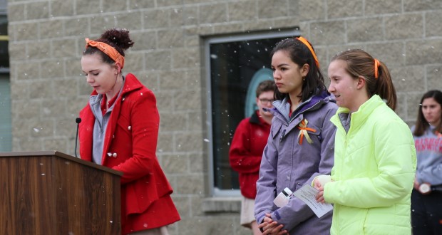 Students pray on National Walkout Day for gun violence victims. (Courtesy Photo)