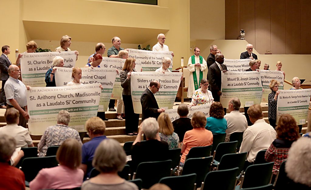 Archbishop Dennis Schnurr, center right, praises the awarded communities during the first annual Laudato Si’ Community recognitions ceremony at Good Shepherd Church in Cincinnati Monday, June 18, 2018. (CT Photo/E.L. Hubbard)