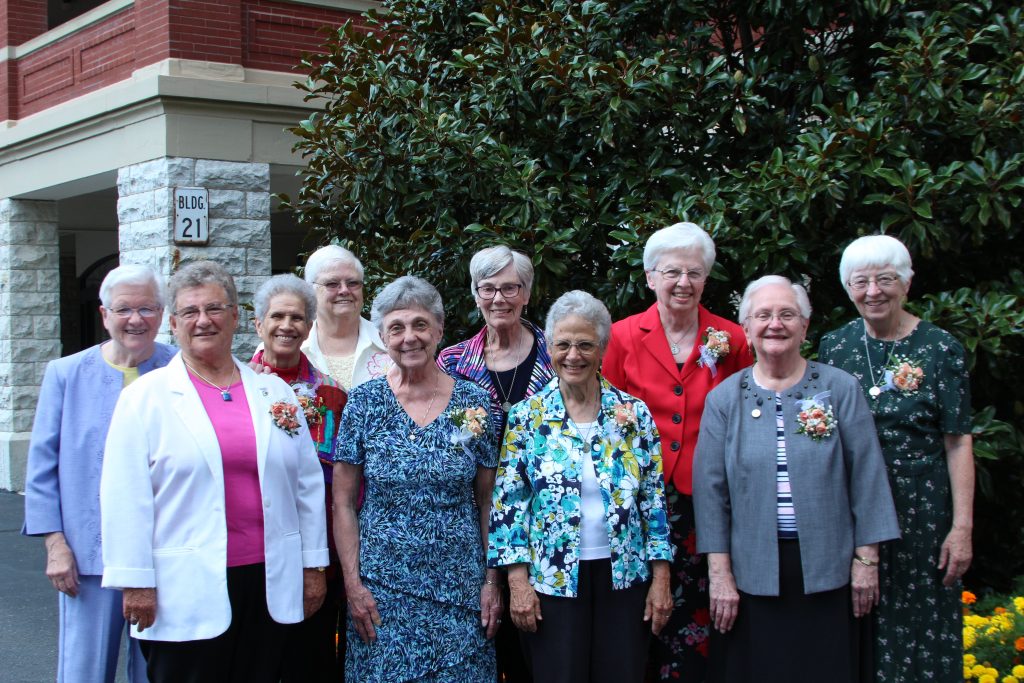 Sisters of Charity celebrating 60 years of service with the Community are: (front row, from left) Sisters Martha Jean Gallagher, Suzanne Donovan, Mary Gallagher, Mary Alice Stein, (back row, from left) Jo Ann Martini, Juanita Marie Gonzales, Clarann Weinert, Joan Wessendarp, Carol Leveque and Maureen Heverin.