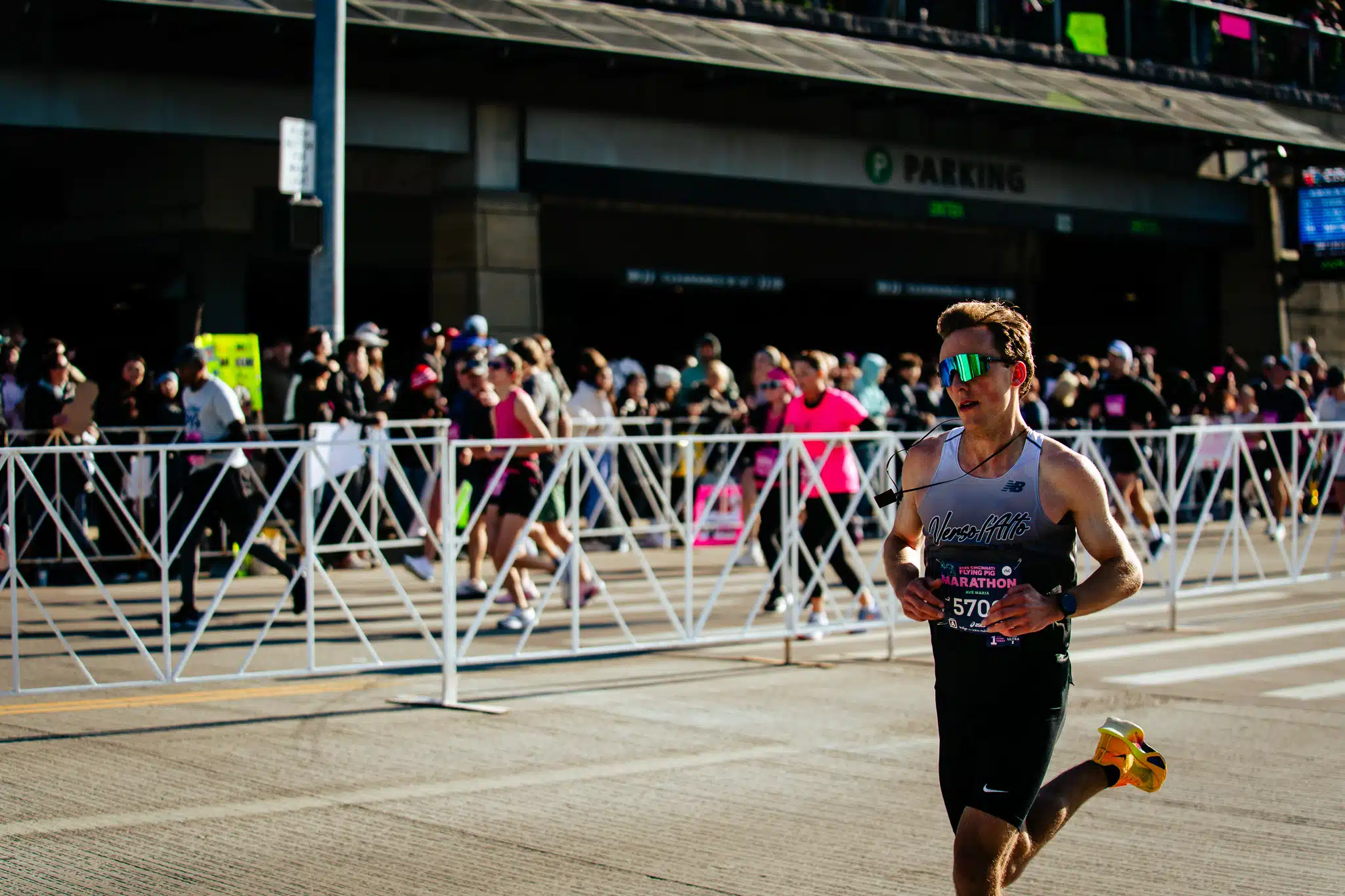 Emerson Wells wears his brown scapular as he races in the Flying Pig Marathon in Cincinnati