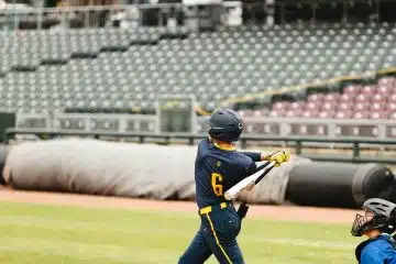 High school baseball player strikes out with humility at the plate